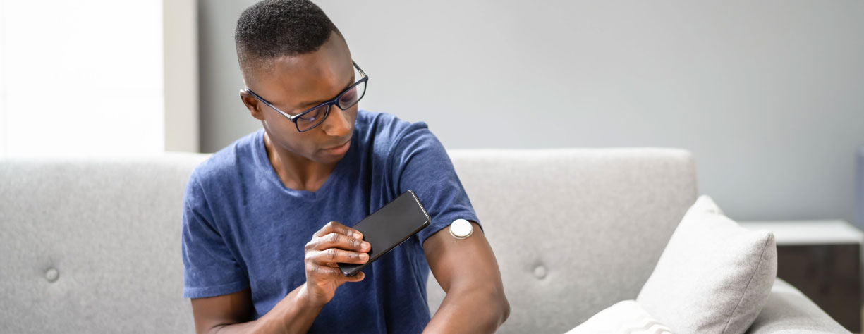 Man checking his blood sugar